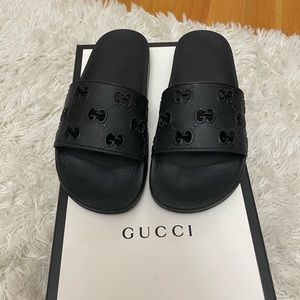 Gucci Women's black monogram GG rubber slides sandals